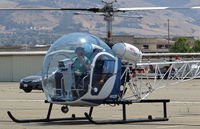 N932B @ KRHV - A locally based 1953 Bell 47G with the pilots having a good time at Reid Hillview Airport, CA. Thanks for the wave! - by Chris Leipelt