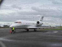 N991TW @ NZAA - on stand (through wire fence!) - by magnaman