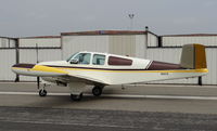 N8657A @ KRHV - Locally-based 1949 Beechcraft A35 Bonanza taxing out for departure at Reid Hillview Airport, San Jose, CA. - by Chris Leipelt