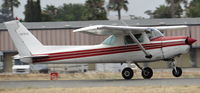 N5151B @ KRHV - Locally-based 1979 Cessna 152 departing runway 31R at Reid Hillview Airport, San Jose, CA. - by Chris Leipelt