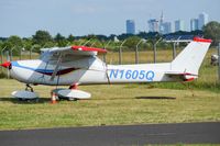 N1605Q @ EPBC - Standing in front of IBEX hangar. - by Eric Strzala
