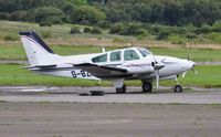 G-BZIT @ EGFH - Visiting Beech Baron operated by Propellerhead Aviation. Previously registered HB-GBS. - by Roger Winser