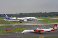 D-ABQG @ EDDL - AirBerlin D-ABQG taxiing in front of ANA Dreamliner JA-814A landing - by Günter Reichwein