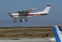 N9894E @ KSQL - 1975 Cessna 182P landing @ San Carlos Airport, CA - by Steve Nation