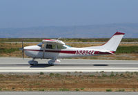 N9894E @ KSQL - 1975 Cessna 182P taking off @ San Carlos Airport, CA - by Steve Nation