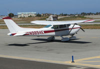 N9894E @ KSQL - 1975 Cessna 182P going over checklist @ San Carlos Airport, CA - by Steve Nation