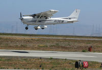 N1361M @ KSQL - Locally-based 2005 Cessna 172S over the threshold @ San Carlos Airport, CA - by Steve Nation
