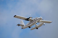N711AF @ BFI - De Havilland Twin Otter after taking off from Boeing Field. - by Eric Olsen