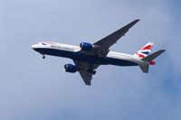 G-VIIH @ BFI - Boeing 777 on final for Seatac. Photo taken from Boeing Field. - by Eric Olsen