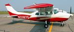 N3387S @ KAXN - Cessna 210J Centurion on the line. - by Kreg Anderson
