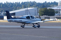 N522RK @ BFI - SR22T taxing out for takeoff - by Eric Olsen