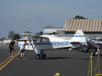 N6940B @ SZP - 1956 Piper PA-22 150 TRI-PACER, Lycoming O-320 150 Hp, spotting the aircraft on transient ramp - by Doug Robertson