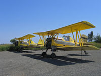N716Y @ CL23 - Last two piston-engined G-164 Ag-Cats operated by Jones Flying Service (N703Y  and N716Y) - rigged as dusters