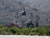 N28TM @ SZP - 2004 Robinson R44 RAVEN, Lycoming O-540 260 Hp derated to 225 Hp for takeoff, 205 Hp continuous, approaching SZP Helipad from Santa Clara River route - by Doug Robertson