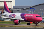 HA-LPM @ EGGW - Wizzair - by Chris Hall