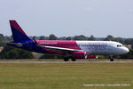 HA-LYQ @ EGGW - Wizzair - by Chris Hall