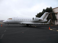 N684TS @ KOAK - 1998 CL-600-2B16 on North Ramp at KOAK - by Steve Nation