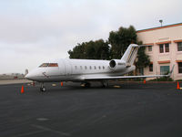 N684TS @ KOAK - 1998 CL-600-2B16 on North ramp at KOAK - by Steve Nation