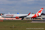 C-FIYE @ EGCC - Air Canada Rouge - by Chris Hall