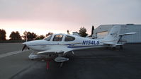 N154LS @ KRHV - Orange Grove Management CO LLC (Louisville, KY) 2004 Cirrus SR22 getting maintence done at Victory Aero at Reid Hillview Airport, San Jose, CA. - by Chris Leipelt