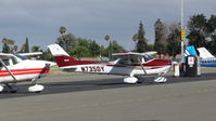 N735DY @ KRHV - 735DY Corp. (Fair Oaks, CA) 1977 Cessna 182Q parked at transient parking at Reid Hillview Airport, CA. - by Chris Leipelt