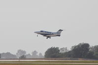 N48TC @ KCID - Departing runway 13, looking into the sun - by Glenn E. Chatfield