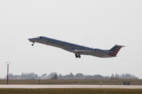 N660CL @ KCID - Departing runway 13, shooting into the sun - by Glenn E. Chatfield