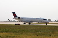 N604QX @ KCID - Taxing to the ramp after landing runway 13.