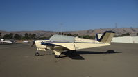 N1808D @ KRHV - Locally-based 1952 Beech C35 sitting at the south tie downs at Reid Hillview Airport, San Jose, CA while the Nice Air ramp gets resurfaced. This is the busiest you will ever see the south tie downs since (as upload date) there are only 11 a/c there. - by Chris Leipelt