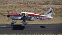 N9494J @ KPAO - Locally-based Piper PA-28-180 landing on runway 31 at Palo Alto Airport, Palo Alto, CA. Photo taken from the control tower. - by Chris Leipelt