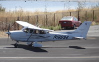 N16894 @ KPAO - G Flux Aviation LLC (Sonoma, CA) 2007 Cessna 172S in the run up area preforming checklists at Palo Alto Airport, Palo Alto, CA. Photo taken from the control tower. - by Chris Leipelt