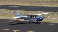 N446ER @ KPAO - Locally-based 2006 Cessna 172S taxing to its tie down after landing at Palo Alto Airport, Palo Alto, CA. Photo taken from the control tower. - by Chris Leipelt