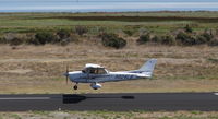 N824LB @ KPAO - Reid Hillview-based 2005 Cessna 172S landing runway 31 at Palo Alto Airport, Palo Alto, CA. Photo taken from the control tower. This photo gives a great view of the bay in the background. - by Chris Leipelt