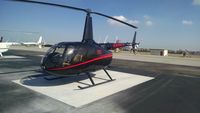 N826CE @ KTOA - New Robinson R66 with Garmin 500H, autopilot, radar altimeter, sitting on the ground. - by Ehud Gavron