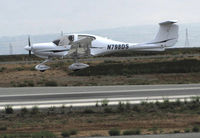 N798DS @ KSQL - Locally-Based 2007 Diamond DA-40 over threshold on overcast morning @ San Carlos Municipal Airport, CA - by Steve Nation