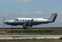 N805SA @ KSQL - Surf Air 2004 Pilatus PC-12/45 operating as URF203 from KHHR (Hawthorne, CA) over the threshold @ San Carlos Municipal Airport, CA - by Steve Nation