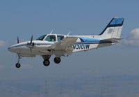 N3101W @ KSQL - Pristine (!) Southern California-Based 1973 Beech E55 arriving from MUVT (Hermanos Ameijeiras, Mexico) @ San Carlos Municipal Airport, CA - by Steve Nation