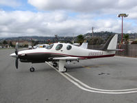 N828TJ @ KSQL - 2012 Lancair Evolution on visitor's ramp @ San Carlos Municipal Airport, CA - by Steve Nation