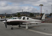 N828TJ @ KSQL - 2012 Lancair Evolution on visitor's ramp @ San Carlos Municipal Airport, CA - by Steve Nation