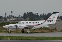 N245T @ KSQL - Oregon-Based 1981 Cessna 421C going over checklist prior to flight to nearby KSJC (San Jose Intl, CA) @ San Carlos Municipal Airport, CA - by Steve Nation