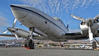 N121BD - Locally-based 1979 Cessna 414A in a new parking spot on the Tradewinds ramp for maintenance. It will be a big job to fix it up since it hasn't flown since 2009, but I heard that TW started it up the other day, and it ran OK with the same engines. - by Chris Leipelt