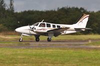 N65MJ @ EGFH - Visiting Beech Baron arriving Runway 22. - by Roger Winser