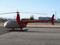 N168AG @ KWHP - Air + Land Ventures 2005 Robinson R44 II with Flight of Discovery badge and cockpit cover @ Whiteman Airport, Pacoima, CA - by Steve Nation