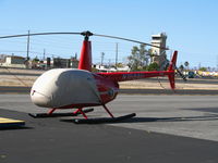 N168AG @ KWHP - Air + Land Ventures 2005 Robinson R44 II with Flight of Discovery badge and cockpit cover @ Whiteman Airport, Pacoima, CA - by Steve Nation