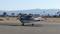 N8734Z @ KRHV - Barbour Flood LLC (Napa, CA) 1968 Cessna P206D sitting on the transient ramp at Reid Hillview Airport, San Jose, CA. - by Chris Leipelt