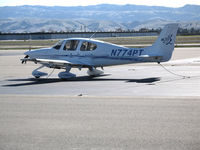 N774PT @ KLVK - 2006 Cirrus SR20 with sun glare (sorry) @ Livermore Municipal Airport, CA (last reported with U.S. owner in France!) - by Steve Nation
