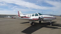N3121W @ KRHV - Santa Barbara-based 1973 Beechcraft Baron 58 sitting at the south tie downs at Reid Hillview Airport, San Jose, CA. - by Chris Leipelt
