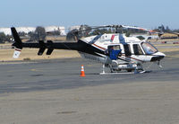 N409PJ @ KCCR - P & J Helicopters (Red Bluff, CA) 1998 Bell Textron Canada 407 with belly pack, side basket and probe @ Buchanan Field, Concord, CA - by Steve Nation
