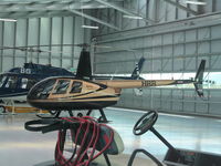 ZK-HRR @ NZHN - inside heliport hangar - by magnaman