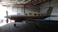 N43VM @ KRHV - Reid Hillview's newest tenant, and it's a good one! Locally-based 2000 Piper Meridian parked in its hangar at Reid Hillview Airport, San Jose, CA. - by Chris Leipelt